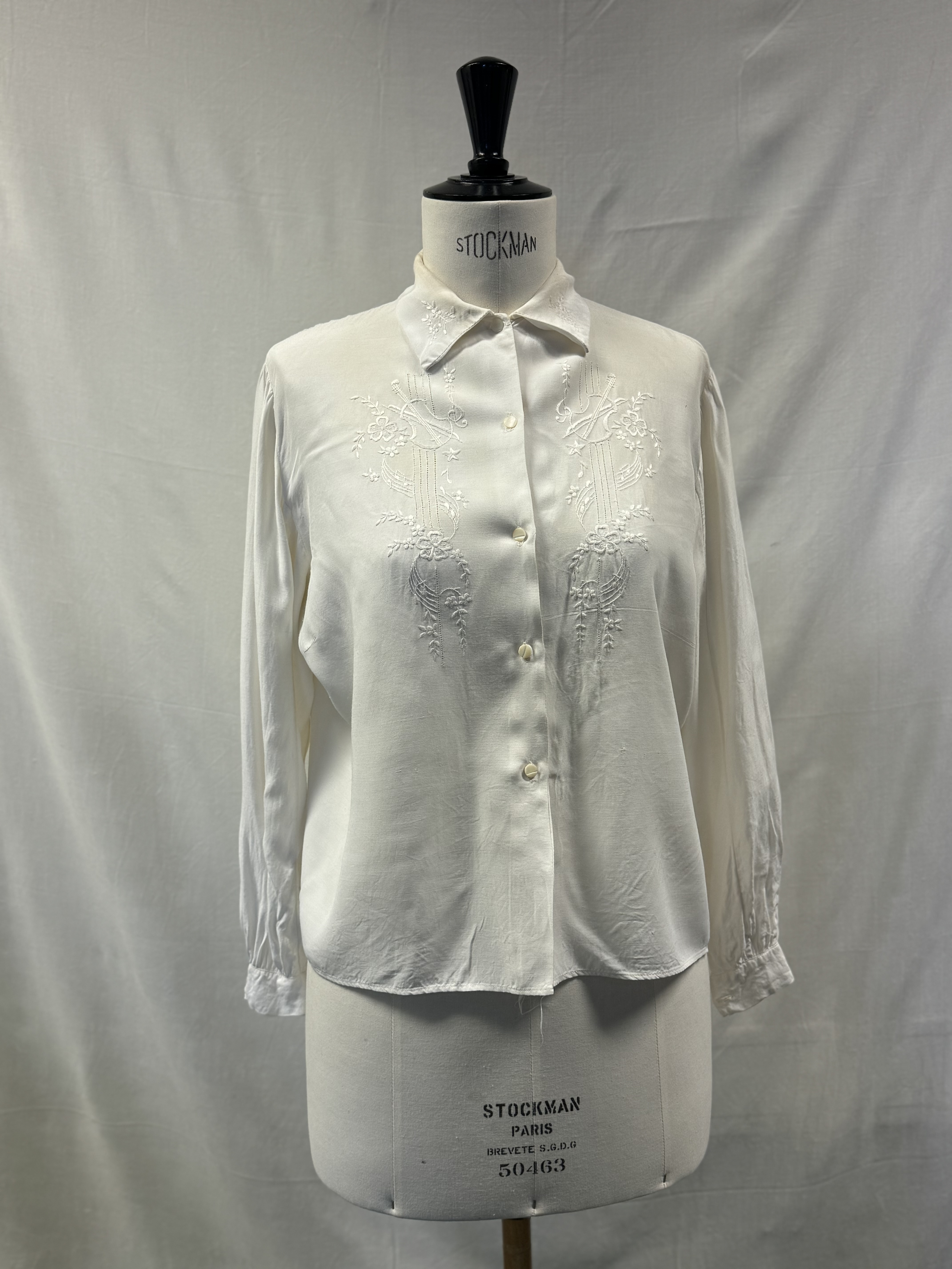 Ivory embroidered blouse