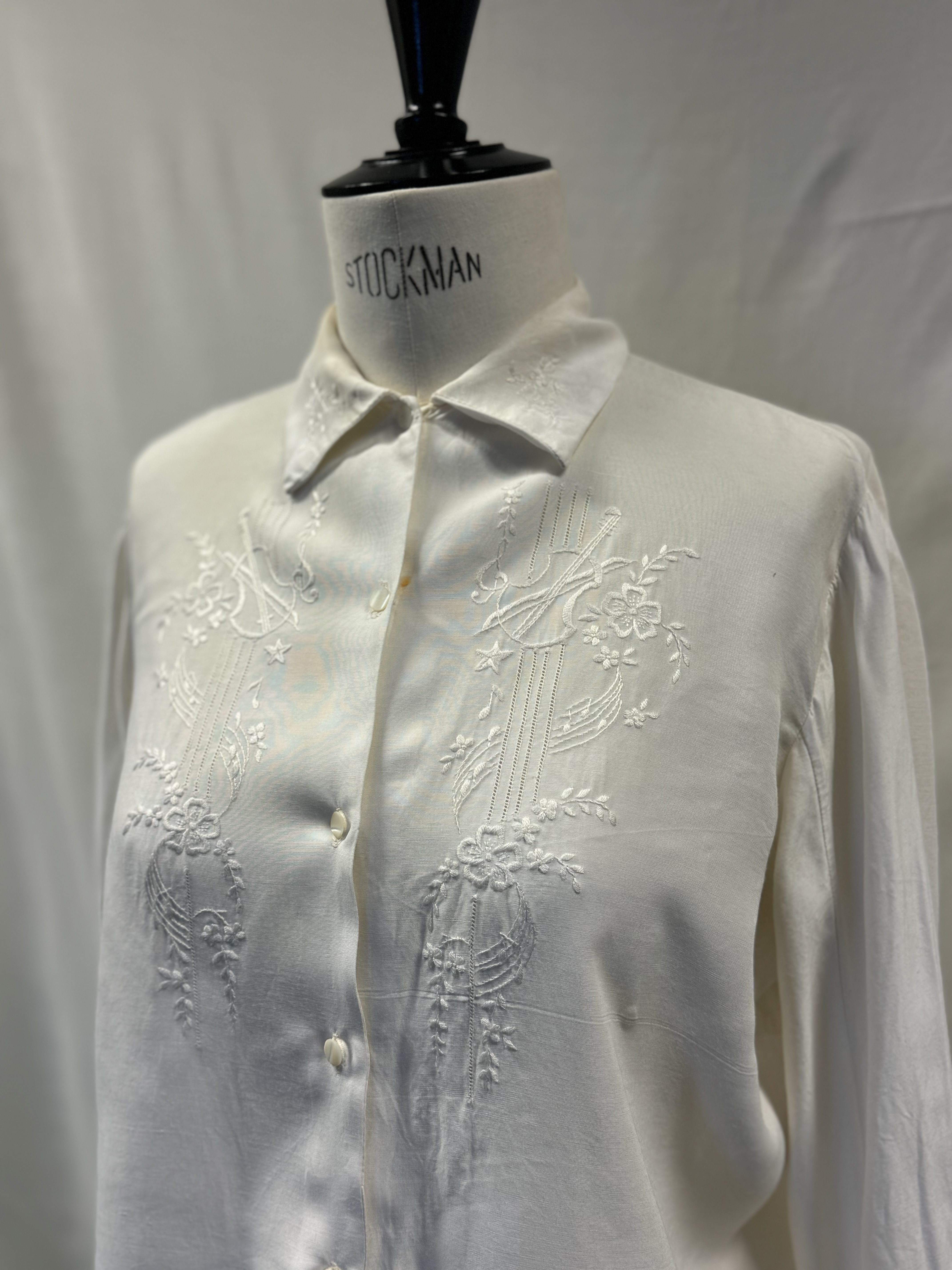 Ivory embroidered blouse