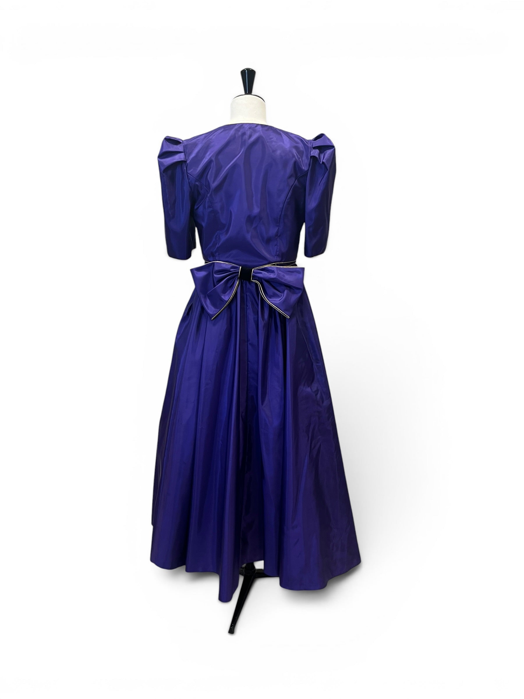 Evening gown, purple with sequins.