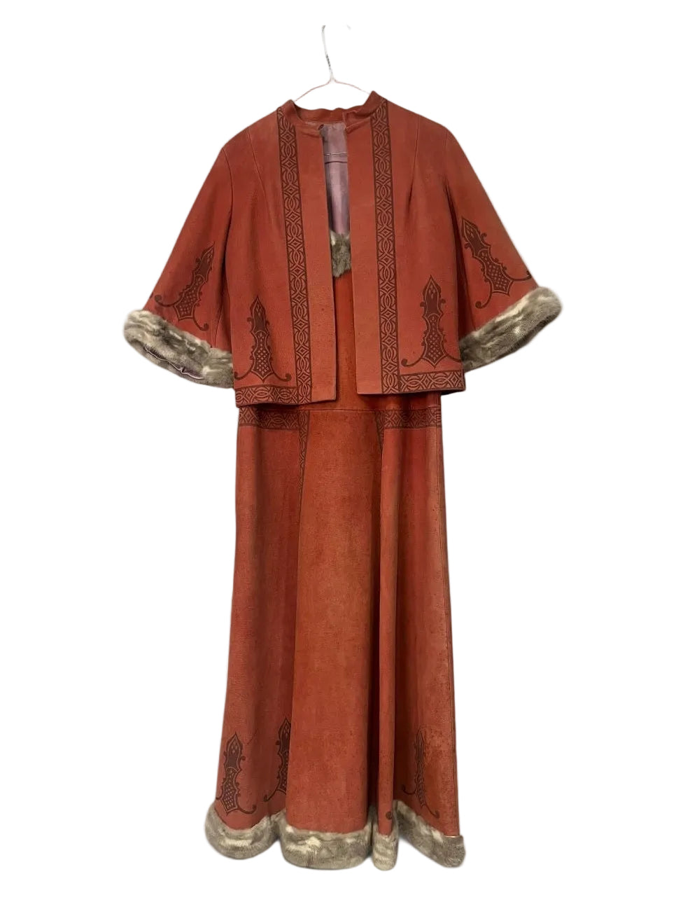 Leather dress 2 piece with fur trimming.